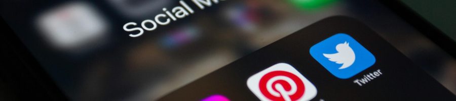 A smartphone screen displaying popular social media applications like Instagram and Twitter.